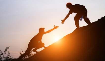 cooperation helping hand climbing overcoming