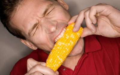 Man eating corn on the cob
