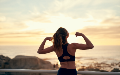 Woman exercising at sunrise