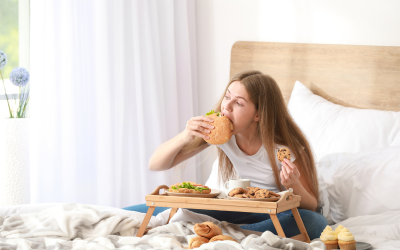 Woman binging on fast food
