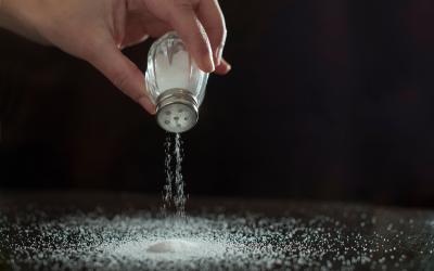 Pouring salt on table