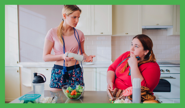 Two women with different foods before them